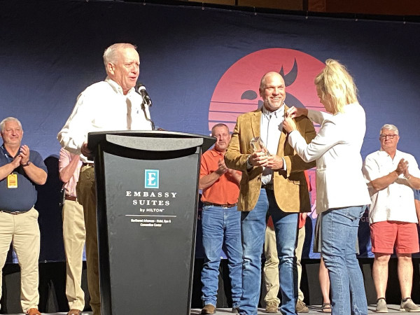 Billy Hufford receiving the award on stage